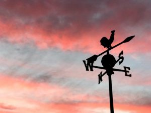 weather vane at sunset